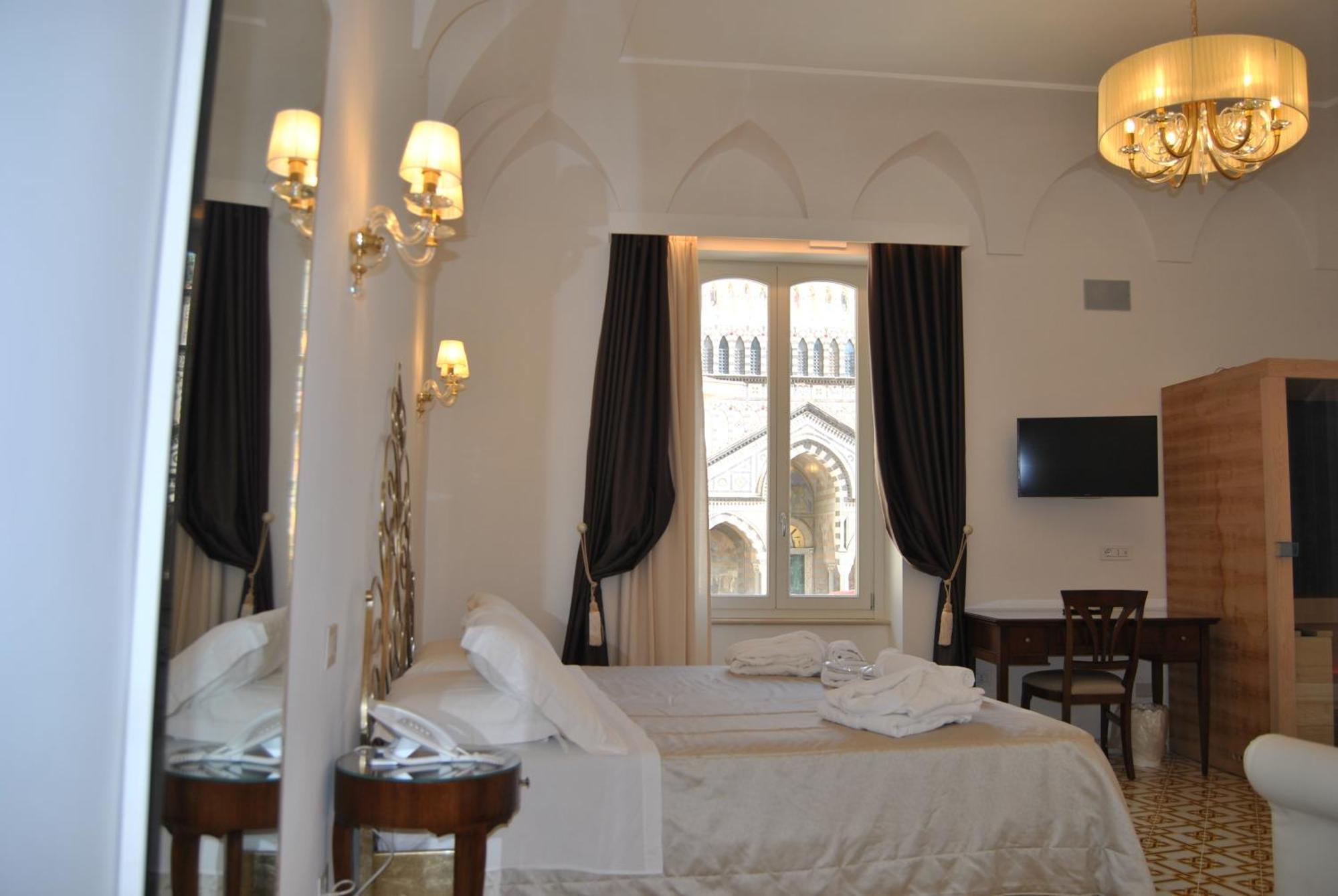 Core Amalfitano City Suites Экстерьер фото