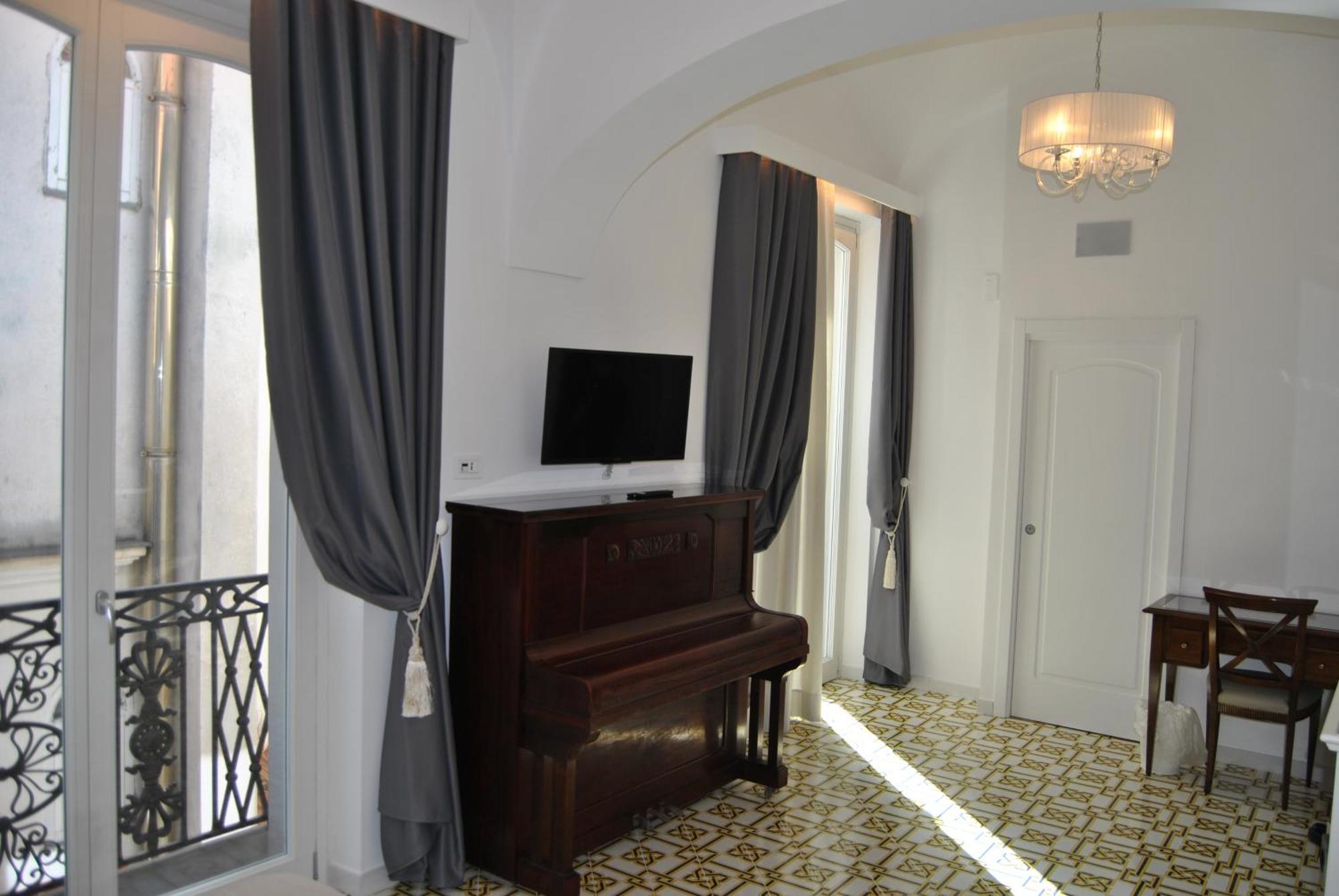 Core Amalfitano City Suites Экстерьер фото